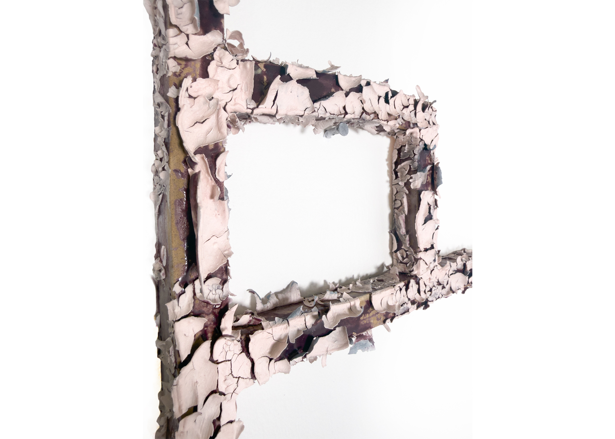 Detail of the surface: thick white flaking glaze over a dark body